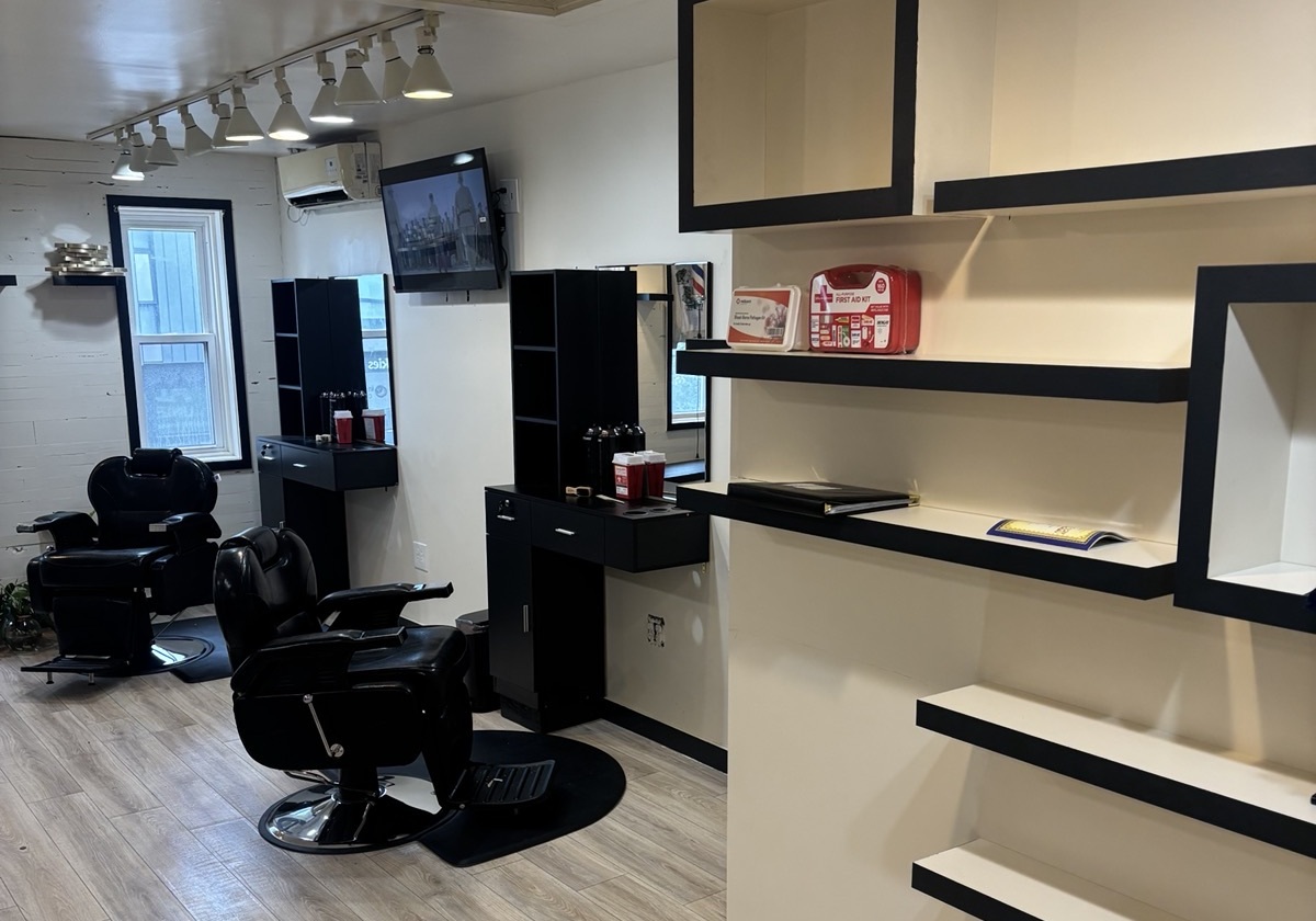 Barbershop interior — styling stations and seating area at 809 Florida Ave NW